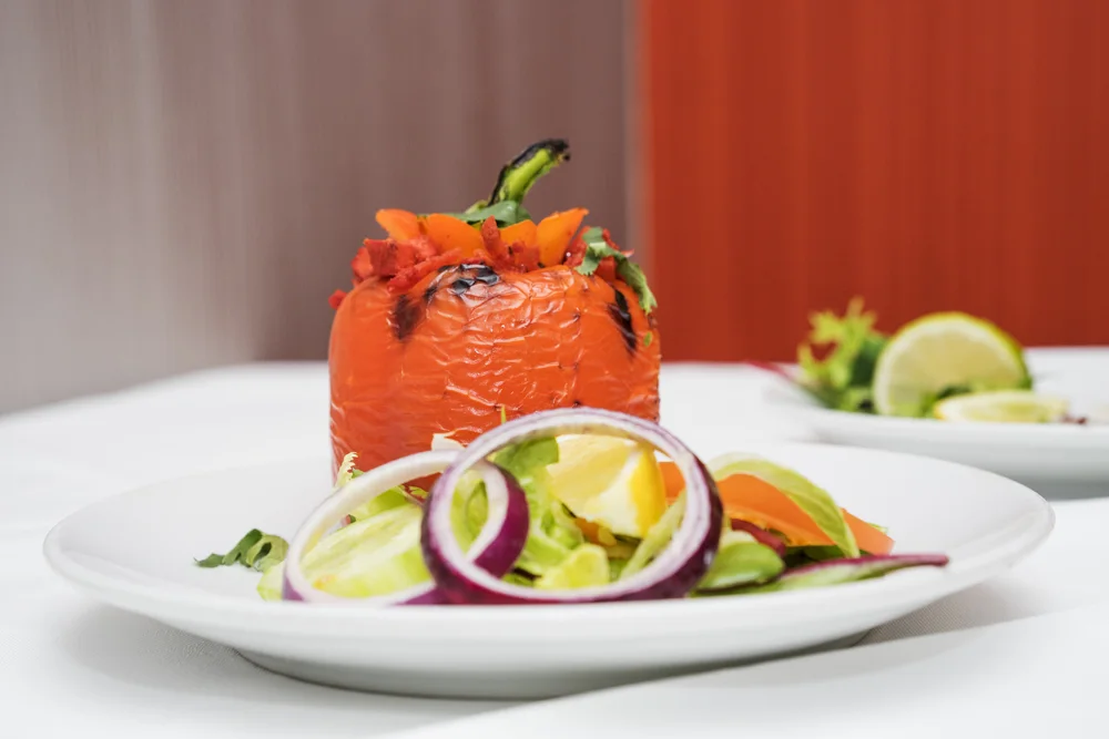 Signature pepper dish with fresh salad